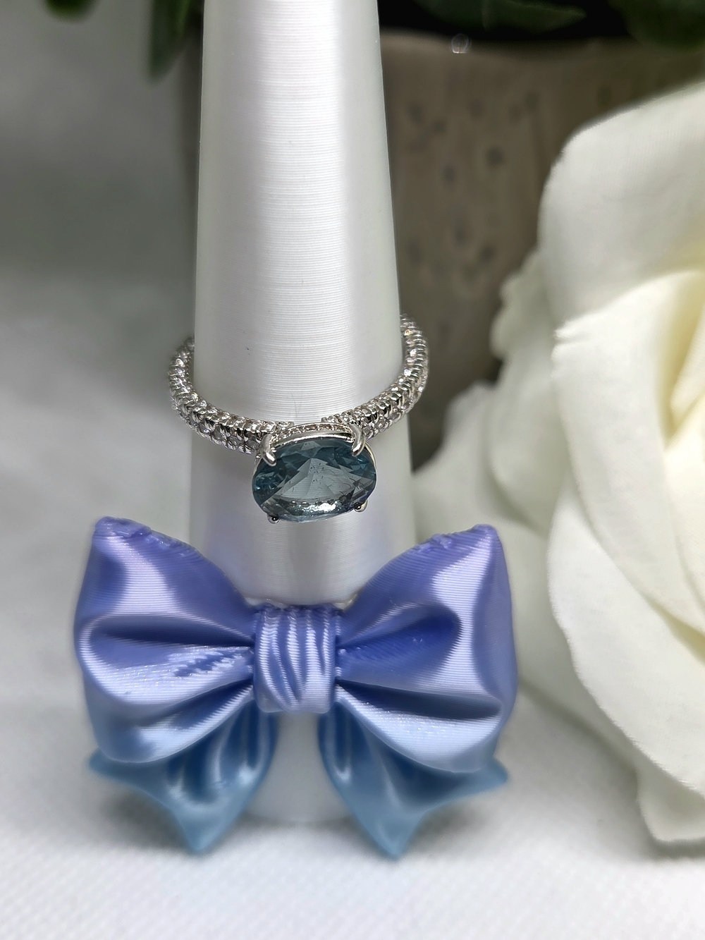 BP Ring With Faceted Blue CZ On Rhodium Plating